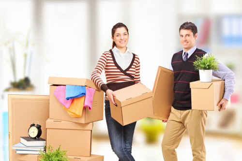 Team handling furniture during a professional house move