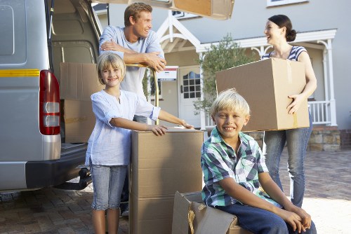 Furniture and boxes being loaded into a moving truck